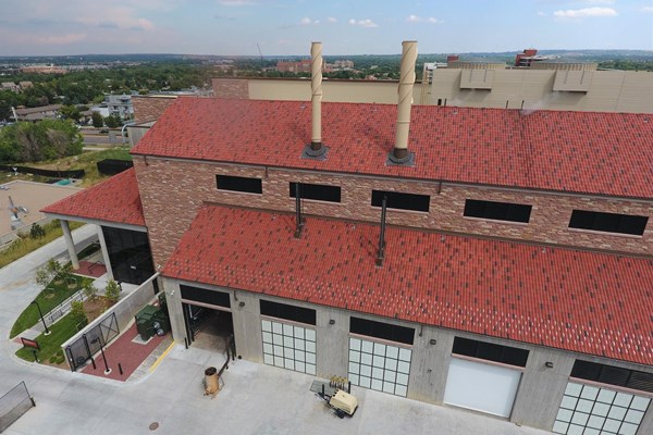 fire station with red shingled roof
