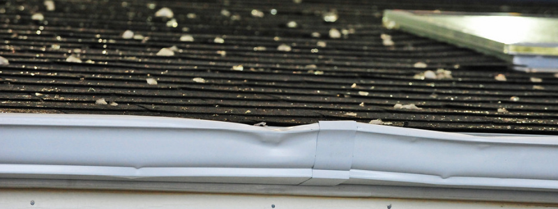 does hail damage roofs